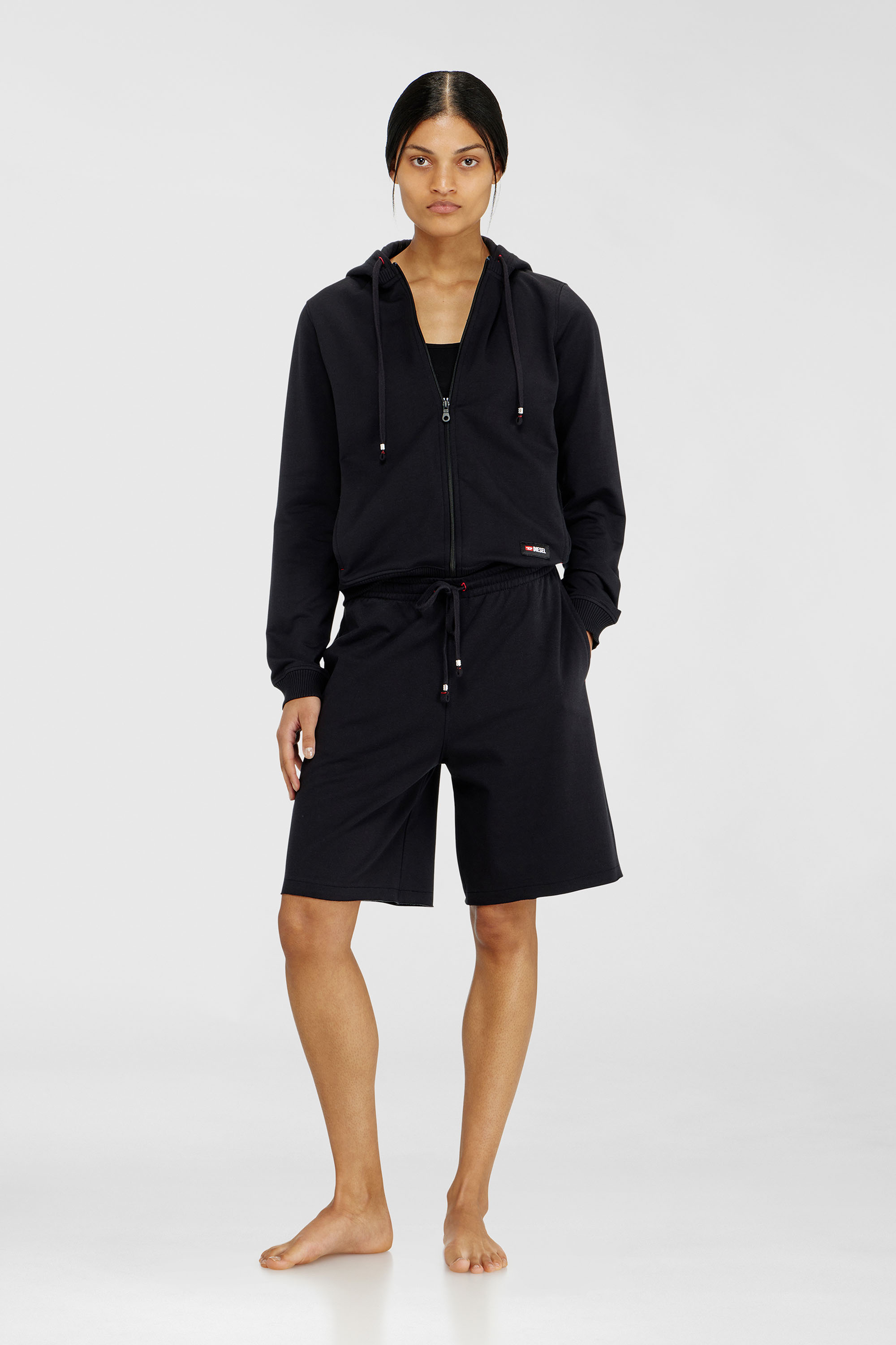 Diesel - CLARA-D-CORE, Woman's Peached sweat shorts with raw hems in Black - 1