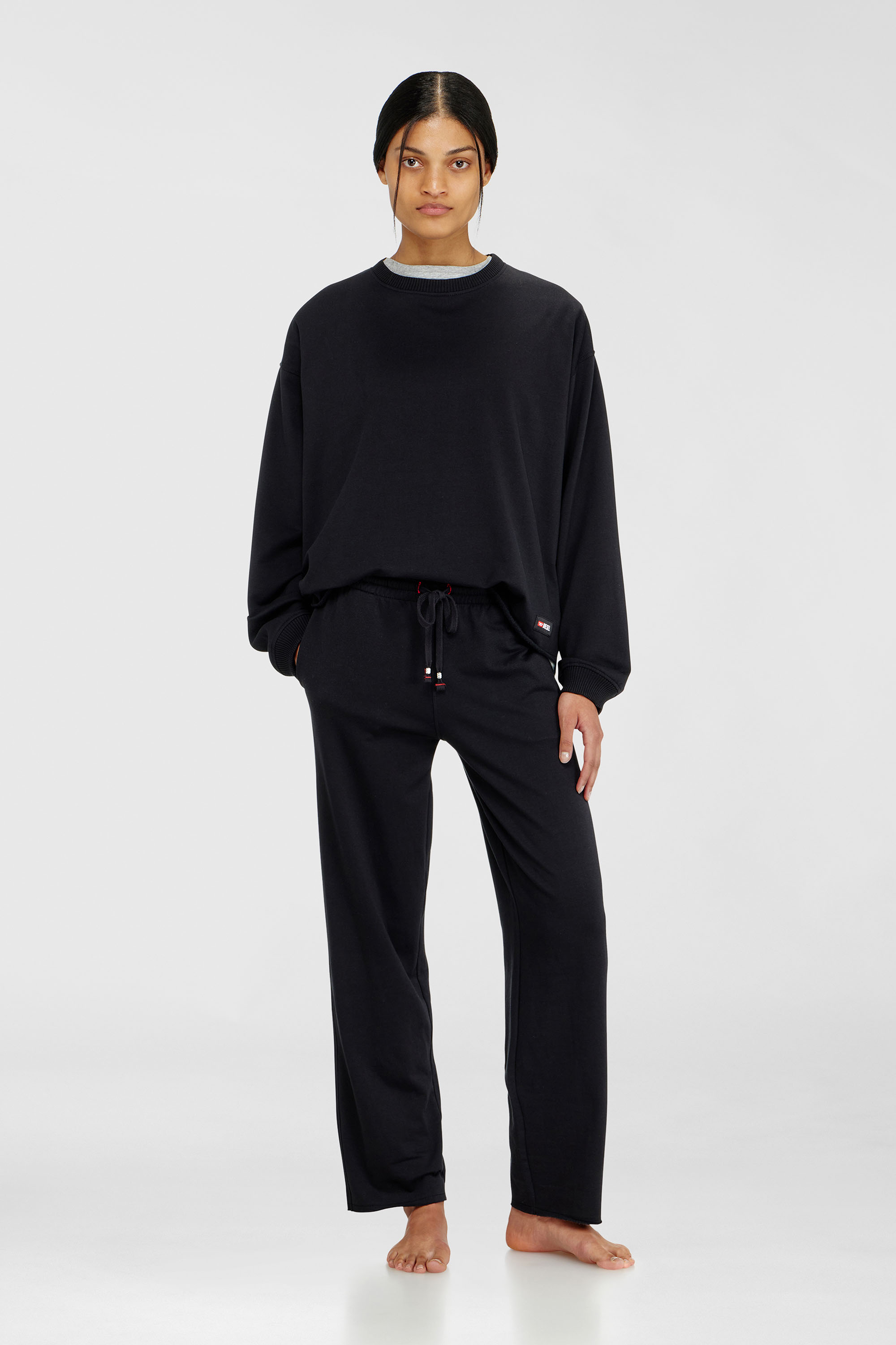 Diesel - INDRA-D-CORE, Woman's Peached sweatpants with raw hems in Black - 1